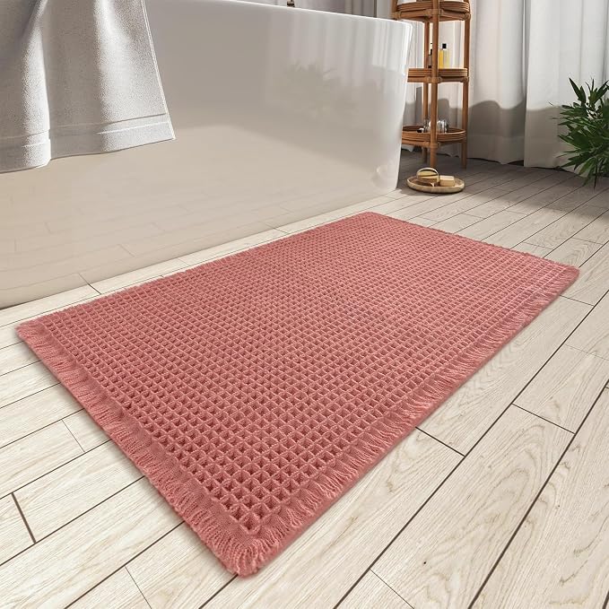 AMOAMI Upgraded Waffle Bath Mat, Super Absorbent Non Slip Bath Mats for Bathroom Floor, Washable Bathroom Rugs with Tassels, Rubber Backed Bathroom Mats, Ultra Soft, 17" x 24", Coral