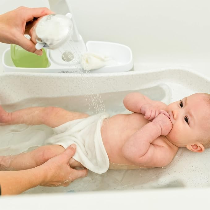 The First Years Rain Showerhead - Soothing Attachable Baby Spa Sprayer with Rotating Arm - Showerhead for Baby Bath Tubs
