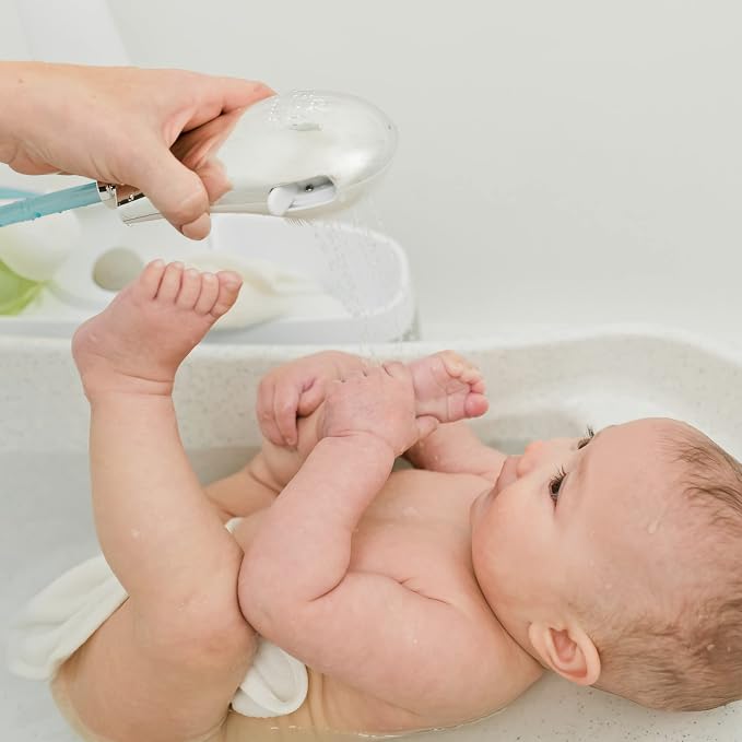 The First Years Rain Showerhead - Soothing Attachable Baby Spa Sprayer with Rotating Arm - Showerhead for Baby Bath Tubs