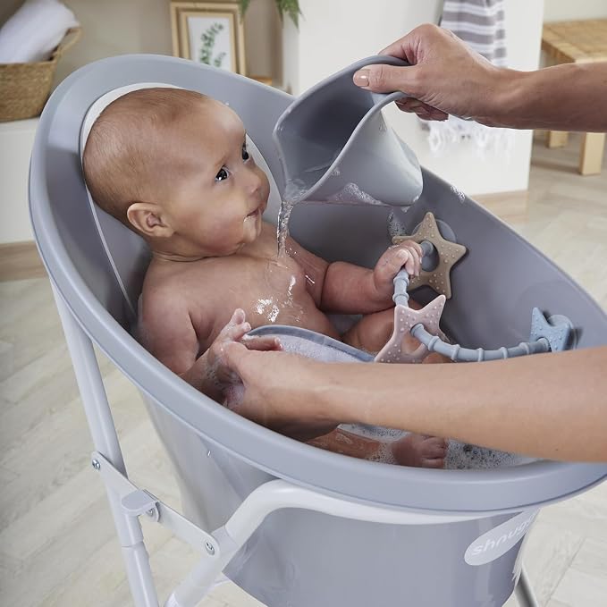 Shnuggle Newborn Bath Essentials Bundle | Baby Bath with Support Bump and Soft Backrest & Rinse Jug | Safe, Gentle, and Stylish Bathtime Set for Babies & Toddlers | Pebble Grey
